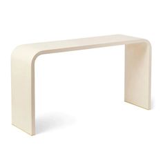 a white table with a curved top on the bottom and an arch shaped like a rectangle