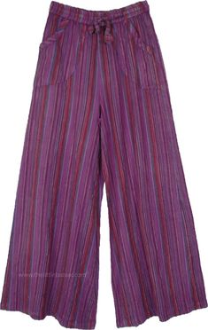 A pair of purple-toned cotton wide-leg pants. With a drawstring waist, these pants ensure absolute comfort - it's made from one piece fabric(rather than patches) and are wide-leg as they come down to the hem. #tlb #SplitSkirtsPants #Striped #BohemianPants Purple Wide Leg Pants With Elastic Waistband, Purple Cotton Wide Leg Pants With Pockets, Purple Wide Leg Cotton Pants With Pockets, Purple Cotton Pants With Elastic Waistband, Purple Cotton Pants With Pockets, Spring Purple Wide Leg Pants With Relaxed Fit, Purple Full Length Wide Leg Pants With Pockets, Purple Relaxed Fit Wide Leg Pants For Spring, Purple Wide Leg Pants For Spring