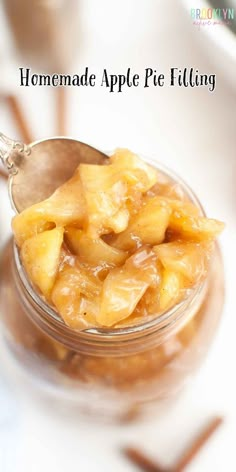 homemade apple pie filling in a small glass jar with a spoon on the side and text overlay that reads homemade apple pie filling