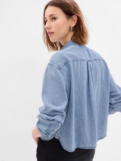 Cropped Denim Shirt | Gap Light Wash Button-up Top With Frayed Hem, Casual Button-up Denim Jacket With Button Cuffs, Chambray Button-up Denim Jacket, Casual Cropped Medium Wash Denim Top, Spring Washed Blue Tops With Button Cuffs, Medium Wash Button-up Top With Frayed Hem, Gap Tops With Button Closure, Washed Blue Button-up Top With Frayed Hem, Trendy Button-up Top With Frayed Hem