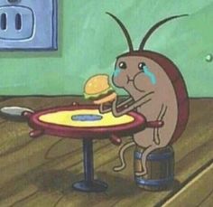 a cartoon bug sitting at a table eating a hamburger