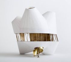 a large white object with gold accents on it