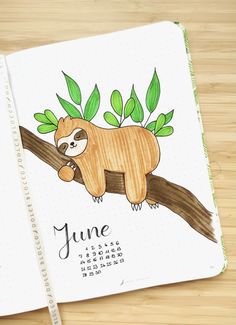 a drawing of a sloth on a tree branch with the word june written below it