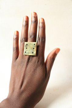 Handcrafted in Nairobi,Kenya. Crafted with brass and infused with horn. Due to the natural material used, the horn dots may vary in darkness. A beautiful piece, a stunning ring! SHIPPING Express shipping (via DHL) takes 2-4 WORKING DAYS to be delivered to you. Vintage Metal Midi Rings As Gift, Handmade Bohemian Rectangular Jewelry, Artisan Open Ring Brass Jewelry, Artisan Brass Open Ring Jewelry, Unique Nickel Free Rectangular Jewelry, Unique Nickel-free Rectangular Jewelry, Unique Brass Toe Ring Jewelry, Handmade Metal Midi Rings For Gift, Handmade Metal Midi Rings As Gift