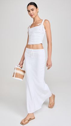 Find NIA Thyme Skirt on Editorialist. Fabric: Lightweight, non-stretch weave. Covered elastic waist with drawstring. Shell: 70% viscose/30% linen. Lining: 95% polyester/5% spandex. Hand wash. Imported, China. Measurements: Measurements from size XS Length: 39.25in / 100.0cm Summer Relaxed Fit Rayon Maxi Skirt, Summer Rayon Lined Maxi Skirt, Summer Day Out Maxi Skirt, Summer Rayon Maxi Skirt With Elastic Waistband, Summer Rayon Maxi Skirt For Day Out, Summer Rayon Maxi Skirt, Summer Rayon Long Skirt, Summer Long Rayon Skirt, Long Rayon Summer Skirt