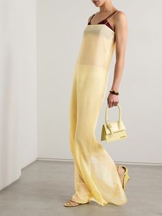 Jacquemus' 'Brezza' gown is alluring and elegant. Designed in a figure-skimming column silhouette, it's made from semi-sheer crepe that's partially lined through the skirt for coverage and has a floor-sweeping hem complete with a back split, so you can move with ease. Underpin yours with a bralette. New York Outfit, Crepe Gown, Devil Wears Prada, Shades Of Yellow, Clothes Collection, Ulla Johnson, Jeans Dress, Women Collection, Denim Dress