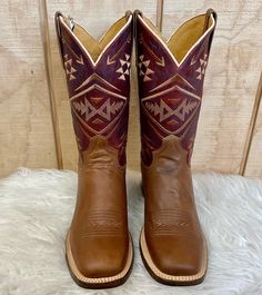 These Roper boots are designed with comfort, durability, quality materials and craftsmanship in mind! When you put these roper boots, you exude timeless western fashion. Burnish Tan leather Marbled Red/Blue leather shaft Square Toe Double Welt 11" Shaft 1 3/8 " Walking Heel Circumference of Calf: 15" REST Removable Insole Measurements for this boot were taken from a size 7.5. Please note that measurements may vary by size. Western Style Square Toe Boots For Western-themed Events, Country Style Ankle Moto Boots For Ranch, Brown Moc Toe Moto Boots For Rodeo, Rustic Square Toe Boots For Rodeo, Western Round Toe Boots, Rustic Square Toe Ranch Boots, Western Work Boots With Reinforced Toe, Rustic Work Boots For Rodeo In Fall, Country Style Ankle Boots For Western-themed Events