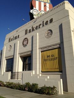 the front of a building with a sign on top