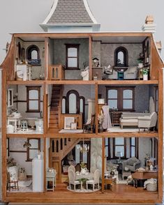 a doll house is shown with all the furniture and accessories in it's display case