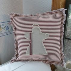 a pillow that has been made to look like a dog