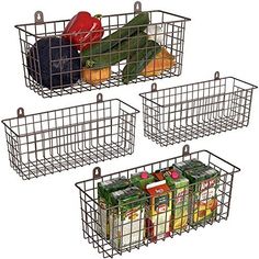 three metal baskets filled with vegetables and fruit