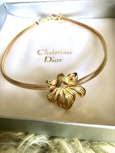 Vintage Rare Collar Necklace by Christian Dior  Orchid Rhinestone Paste Necklace with Omega-Style Gold Plated Collar Necklace  In its original Christian Dior Box  Perfect example Signed Chr.Dior on Double clasp and back of the pendant. The pendant measures 3.3 x 3.5 cm The Necklace measures approx. 39 to 40 cm inc pendant width. Excellent condition  Fabulous, rare piece from the House of Dior Free UK special delivery  Please check out my shop TotallyExquisite for more vintage designer jewellery Dior Jewelry Vintage, Vintage Designer Accessories, Vintage Designer Necklace, Gold Designer Necklace, Dior Jewelry Aesthetic, Vintage Dior Aesthetic, Christian Dior Vintage 1950s, Dior Jewerly, Dior Jewellery