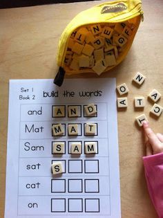 a banana sitting on top of a wooden table next to words that spell out sight