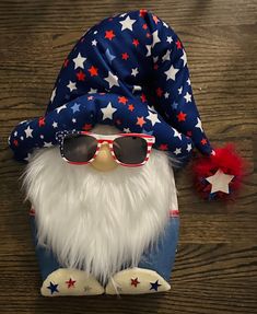 an image of a gnome with sunglasses and stars on it