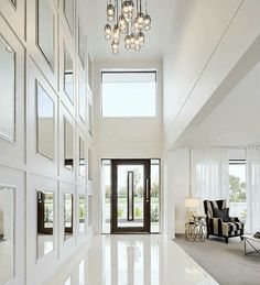 a large white room with lots of windows