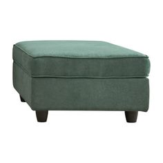 the footstool is made out of wood and has a green fabric on it