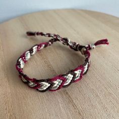 A Handmade Bracelet Or Anklet Woven With Shades Of White, Red, And Brown Colors. A Friendship Or Statement Bracelet Perfect For This Summer! Approx. 9 Inches/ 30 Centimeters Long. 10 Woven Bracelets For $25. Adjustable Burgundy Bracelets, Handmade Burgundy Bracelets As Gift, Handmade Burgundy Bracelet As A Gift, Friendship Bracelets Keychains, Gold Knot Bracelet, Alpha Bracelet, Crystal Cuff Bracelet, Arrow Bracelet, Faux Pearl Bracelet