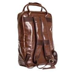 Custom engraved with your logo, our Swanky Badger Vegan Leather Backpack is the perfect, premium backpack for your staff or clients.The outer shell is made with our Brown Premium Vegan leather, and inside you will find plenty of storage. There's a designated padded pocket large enough for a 17" laptop, as well as a zippered interior pocket to hold smaller items, and large exterior flap pocket to house chargers and cords. Bag features include; - Laser Engraved with your Logo - Adjustable Shoulder Vegan Leather Backpack, His Style, Something Big, Going Back To School, Laptop Pocket, Laptop Backpack, Custom Engraving, Badger, Flap Pocket