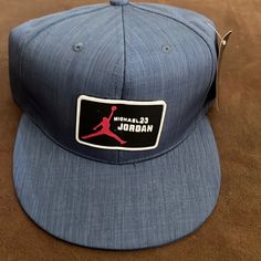 Kndit Caps Premium Cap Michael Jordan 23 Blue New With Tag 1b Casual Blue Flat Brim Baseball Cap, Blue Fitted Hat With Curved Bill For Streetwear, Blue Fitted Hat With Flat Brim, One Size, Blue One Size Fitted Hat With Flat Brim, Blue Sports Hat With Curved Bill, Blue Curved Bill Fitted Hat For Sports, Blue Fitted Hat With Curved Bill For Sports, Blue Fitted Hat With Curved Bill, Casual Blue Flat Brim Hat