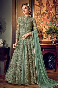 COLOR : Mint Green FABRIC : Top (Jacket) - Net, Bottom (Lehenga) - Santoon, Inner - Crushed Satin, Dupatta - ChiffonWORK : Heavy Zari Work, 3D Tonal Glitter Cord Work, Stones, Sequins, Lace Border OCCASION : Wedding, Reception, Engagement READY-TO-WEAR : NoSTITCHING : Available as semi-stitched fabric, can be stitched using standard size option (+$30). Note: There might be a slight color variation due to lighting and flash used during photoshoot. The bright shade seen is the best closer view of Indian Anarkali Dresses, Lehenga Anarkali, Ethnic Saree, Indian Anarkali, 3d Material, Anarkali Lehenga, Designer Anarkali Suits, Lehenga Suit, Abaya Style