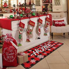 a kitchen decorated for christmas with stockings and decorations