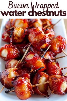 bacon wrapped in toothpicks on a white plate