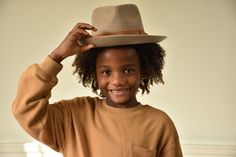 Your favorite hat, just a little smaller. From family pictures, to running errands, to play dates at the park - The Tan Galilee Rancher Kids Hat can go everywhere your fearless kids do. Style - Teardrop Rancher Material - 100% Australian Wool Hat Size - 21 inches (53 cm) Dimensions - Crown: 10 cm + Brim: 7.5 cm Playful Brown Hat, One Size Fits Most, Playful Brown Adjustable Hat, Playful Adjustable Hats For Fall, Playful Fall Hat One Size Fits Most, Casual Fedora With Flat Crown For Country Events, Casual Flat Crown Hat For Country Events, Rancher Hats, Aesthetic Family, Outfit For Kids