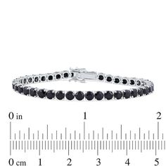 Wrap your wrist in sophisticated and chic style with this men's black spinel tennis bracelet - a great choice for day or night. Fashioned in sterling silver This look showcases an endless row of 5.0mm round rich black spinels. The 8.5-inch bracelet secures with a tongue and groove clasp. Classic Tennis Bracelet With Black Diamonds For Formal Occasions, Classic Tennis Bracelet With Black Diamonds, Classic Black Diamond Bracelet For Formal Occasions, Classic Black Diamond Bracelet, Classic Silver Tennis Bracelet With Black Diamonds, Classic Black Diamond Bracelet For Anniversary, Black Tennis Bracelet With Black Diamonds For Formal Occasions, Formal Black Sterling Silver Round Bracelet, Formal Black Round Sterling Silver Bracelet