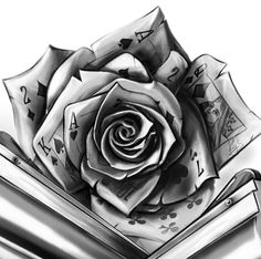 a black and white drawing of a rose with playing cards on it's petals