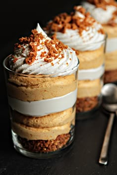 three desserts with whipped cream and cinnamon on top