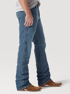 NOTHING BEATS AN ORIGINAL, BUT THIS MIGHT Since 1947, Wrangler® jeans have been a cowboy-approved wardrobe staple. Inspired by our Western heritage, these Wrangler® Retro® jeans combine our most iconic features with contemporary fits and washes. This updated classic features the same worn leather patch with our rope logo, 'W' stitching on the back pockets, and five-pocket styling. These men's slim bootcut jeans feature a streamlined silhouette through the seat, thigh, and knee, but the leg widen Straight Leg Denim Jeans For Ranch, Western Style Straight Leg Denim Bottoms, Rugged Medium Wash Bottoms With Standard Cut Leg, Ranch-style Medium Wash Jeans With Five Pockets, Medium Wash Jeans For Ranch, Medium Wash Bottoms With Pockets For Ranch, Medium Wash Jeans For Rodeo With Standard Cut Leg, Western Jeans With Five Pockets And Standard Cut Leg, Standard Cut Denim Bottoms For Rodeo