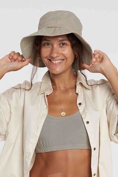 ABOUT THIS PIECE Our Bronte Bucket Hat is the beach essential you legit can't get through Summer without. The Hat that travels with you in your handbag, back pack, car, pram... boyfriends bag. You name it, every one & every occassion wants your Bronte Bucket Hat! Not only is she cute in Style, perfect to fold up in your traveling wardrobe, can be worn folded up or down (The stiff Canvas fabric makes it perfect for this), Bronte is also available in 5 clean Plant Dyed colourways. Once you pop Bro Summer Beach Bucket Hat Washed, Summer Beach Washed Bucket Hat, Everyday Lightweight Sun Hat, Beach Cotton Bucket Hat Washed, Washed Cotton Bucket Hat For Beach, Beach Bucket Hat In Washed Cotton, Casual Hats For Everyday Beach Season, Casual Everyday Hats For Beach Season, Khaki Cotton Sun Hat For Beach