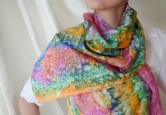 Vintage hand dyed pure silk scarf from the 1990's. Women's handmade long silk scarf in hand dyed in bright contrasting colors - pink, green, blue, orange. Has a handrolled finish. High quality lightweight silk! Material: 100% Silk Made in China Size: 56.2 inches (142.7 cm) x 15.7 inches (40 cm) Condition: Excellent vintage condition! Summer Hand Dyed Tie Dye Scarves, Summer Hand-dyed Tie-dye Scarves, Hand Dyed Silk Scarf For Summer, Bohemian Hand-dyed Multicolor Silk Scarf, Hand Dyed Silk Scarves For Summer, Hand-dyed Silk Scarves For Summer, Multicolor Hand Dyed Silk Scarves, Orange Hat, Long Silk Scarf