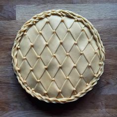 a pie sitting on top of a wooden table