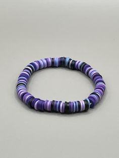 ♡ A stylish bracelet for any occasion! ♡ Trendy Hand-strung Purple Bracelets, Adjustable Purple Wristband With Round Beads, Trendy Purple Beaded Bangle Bracelet, Trendy Handmade Purple Wristband, Trendy Purple Bracelets For Beach, Purple Beaded Bracelets With Black Beads As A Gift, Adjustable Purple Bracelets With Black Beads, Adjustable Purple Bracelet With Black Beads, Stylish Bracelet