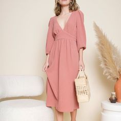 The Josie Is A Midi Length Dress With Puffy Long Sleeves, A V-Neckline, And Tie Waist. *Seams Slightly Pull After First Wear.* Feminine Midi Dress With Surplice Neckline For Brunch, Feminine Surplice Neckline Midi Dress For Brunch, Feminine V-neck Surplice Dress For Brunch, Feminine Midi-length V-neck Dress For Brunch, Feminine Midi Length V-neck Dress For Brunch, Feminine V-neck Midi Length Dress For Brunch, Puffy Long Sleeves, Terracotta Color, Midi Length Dress