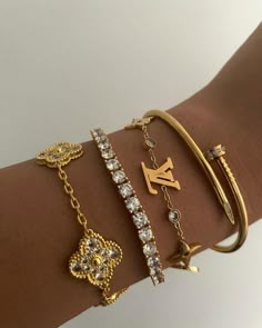 Gold Stack Bracelets, Bracelet Dior, Dream Purse, Bracelets With Charms, Gold Jewelry Aesthetic, 2025 Goals, Bracelet Aesthetic, Luxury Bracelets