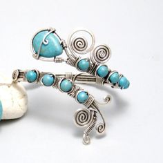 Looking for glorious turquoise jewelry? This turquoise cuff bracelet is perfect. This lightweight turquoise bracelet are a lovely addition to any wardrobe. It is suitable has an elegant, rustic look to it. This is really striking bracelet for every occasion. This turquoise cuff bracelet is formed using traditional wire wrapping techniques and has been oxidized to give it a more antique and magical look. I will cover it with special lacquer for metals. That will help to keep this bracelet bright Unique Blue Nickel-free Cuff Bracelet, Blue Bohemian Wire Wrapped Cuff Bracelet, Turquoise Hand Wrapped Cuff Bracelet, Hand Wrapped Turquoise Bangle, Bohemian Turquoise Wire Wrapped Cuff Bracelet, Turquoise Wire Wrapped Bangle Cuff Bracelet, Turquoise Bangle Cuff Bracelet Gift, Adjustable Turquoise Cuff Bracelet Wire Wrapped, Turquoise Wire Wrapped Cuff Bracelet