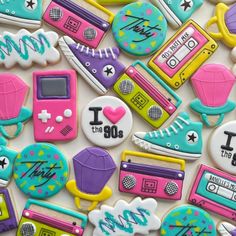 decorated cookies with different types of items on them and the words i love 80s written in large letters