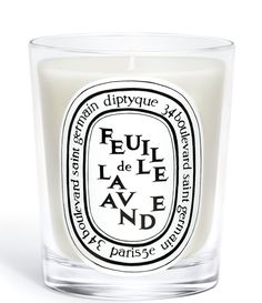 a candle that is sitting in front of a white background with the words ful de lave avend on it