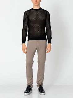 Dare to stand out with our See Through Fishnet Muscle Fit Shirt, the epitome of rebellious style and confidence. Crafted from high-quality fishnet fabric, this shirt offers a unique blend of sensuality and streetwear flair. Designed to showcase your physique, the muscle fit silhouette hugs your body in all the right places, accentuating your muscular build and adding a touch of allure to your look. The see-through nature of the fishnet fabric adds an element of mystery and intrigue, allowing you