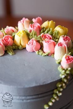 there is a cake with flowers on it