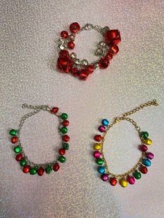 Get into the christmas spirit with these jingle bell charm bracelets! Celebrate the holidays with cheer and of course accessorize yourself for the occasion✨. Check out our charm bracelets section or our seasonal items! *Each bracelet is made with stainless steel materials only *Choose from 3 different styles: red & silver, red and green, or colorful bells. *Adjustable, reaches up to 7.5 inches If you have any questions, please don't hesitate to ask! We are friendly:) Visit our official website: www.yeetincolorboutique.com and follow us on Instagram: @yeetincolorboutique Jingle Bell Bracelets, Bell Bracelet, Xmas Jewelry, Christmas Charms, Jingle Bell, Jingle Bells, Charm Bracelets, Christmas Spirit, The Christmas