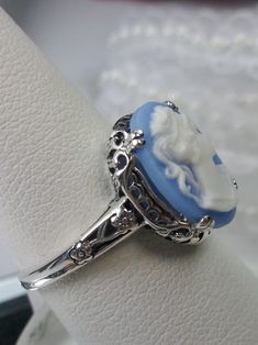 Blue Lady Cameo Ring, Sterling Silver Floral Filigree, Vintage Edwardian Jewelry, Silver Embrace Jewelry Elegant Cameo Rings, Elegant White Cameo Ring, Elegant Cameo Rings For Collectors, Ornate Cameo Jewelry For Anniversary, Elegant Silver Carved Filigree Ring, Elegant Oval Filigree Ring With Intaglio, Ornate Intaglio Jewelry For Anniversary, Elegant Carved Sterling Silver Filigree Ring, Carved Sterling Silver Filigree Ring