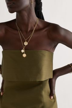 Foundrae's pieces are centered around symbols that connote strength and wellness. This 18-karat gold necklace is strung with two charms - the diamond-encrusted 'Mind Body Soul' pendant represents generations of powerful women, while the enameled 'Wholeness' one is bordered by an ouroboros to signify rejuvenation. Luxury Gold-tone Jewelry With Pearl Pendant, Elegant Gold Coin Necklace With Pearl Charm, Luxury Gold-tone Pendant Necklace, Luxury Gold Chain Necklace With Pearl Charm, Elegant Gold-tone Medallion Charm Necklaces, Elegant Gold-tone Medallion Charm Necklace, Luxury Gold Plated Necklace With Pearl Pendant, Luxury Gold-plated Necklaces With Pearl Pendant, Luxury Gold-plated Necklace With Pearl Pendant