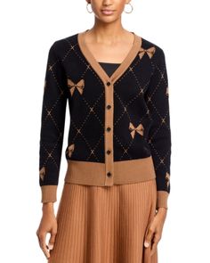 Nancy Yang Bow Print Cardigan Luxury Black Sweater For Fall, Luxury Black Fall Sweater, Luxury Spring Cardigan For Formal Events, Luxury Spring Cardigan, Designer Formal Sweater For Fall, Luxury Spring Cardigan For Workwear, Luxury Spring Cardigan For Work, Luxury Fitted Fall Cardigan, Luxury Black Cardigan For Formal Occasions