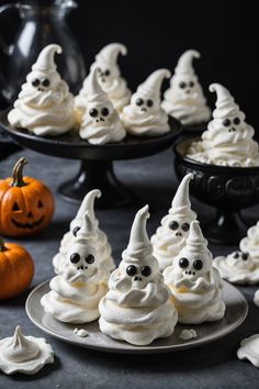 A photo of a  Ghostly Meringues which is a type of halloween treat recipes Spooky Halloween Food For Kids, Cute Halloween Baking Ideas, Halloween Truffle Ideas, Halloween House Party Food, Halloween Tea Party Food, Halloween Spooky Treats, Funny Food Ideas, Halloween Bakery Ideas, Halloween Eats Ideas