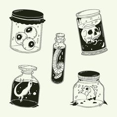 four jars filled with different types of liquid and skulls in them, one is black and white