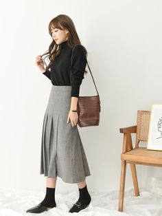 Pleated wool blend skirt, midi length. Model is in MINUSEY S. Please allow 5-12 days to ship when in restocking. * MINUSEY S = EU 34, US 2* MINUSEY M = EU 36, US 4* Wool Blend* Dry clean* Made in Korea - Model Height: 163cm/5'3" (US2, EU34) Elegant Wool Pleated Skirt For Work, Wool Midi Skirt For Workwear, Flared Skirt For Workwear In Fall, Winter Office Lady Skirt, Midi Length Bottoms For Office In Fall, Business Casual Midi Length Bottoms For Fall, Fall Office Skirt, Midi Length Bottoms For Workwear In Fall, Knee-length Fall Skirt For Office