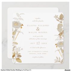 an elegant wedding card with flowers and leaves on the front, in gold foiling